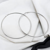 The large hoops bring a touch of glamour to any outfit, while the stainless steel material ensures long-lasting wear.