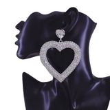 The sparkling rhinestones and delicate dangle heart design make them perfect for any occasion.