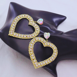 The sparkling rhinestones and delicate dangle heart design make them perfect for any occasion.