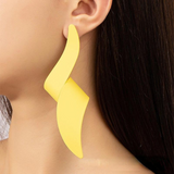 Feature a vibrant yellow, long twist design, crafted with high-quality materials