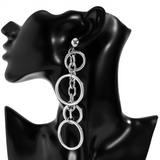 Bold Punk Link Circle Chain Earrings! Measuring 4.9 inches in length and 1.3 inches in width, these striking earrings feature a unique design that captures attention with their great movement and bold aesthetic.